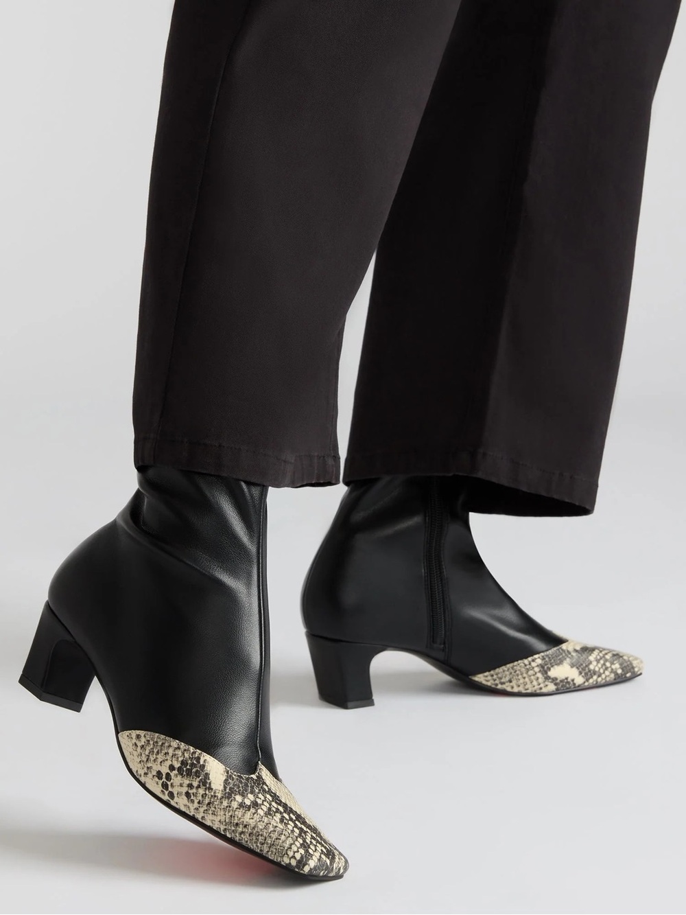 Steve Madden Jeter Black Ankle Boots with Snake-Print Toe Cap